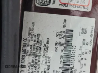 2012 Ford Fusion SEL z VIN 3FAHP0JA5CR184593, wystawiony jako Copart lot #61647265 z przebiegiem 127 720 mil mil oraz Szkoda całkowita • Salvage title. Historia ofert i sprzedaży dostępna na DreamBid. Obrazek 13.