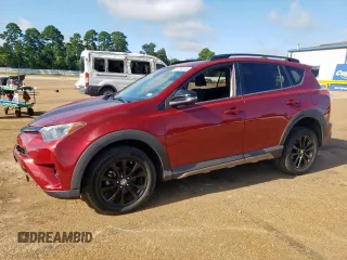 2018 Toyota RAV4 XLE with VIN 2T3RFREV7JW818661, listed as a Copart auction lot 65756615 with 56,369 mi miles and Salvage title. Bid and sale history available at DreamBid. Image 1.