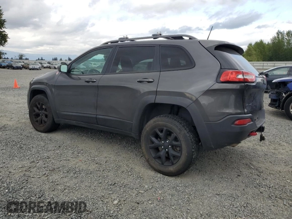 2017 Jeep Cherokee Trailhawk z VIN 1C4PJMBS0HW577055, wystawiony jako Copart lot #56428235 z przebiegiem 137 296 mil mil oraz Szkoda całkowita • Salvage title. Historia ofert i sprzedaży dostępna na DreamBid. Obrazek 2.