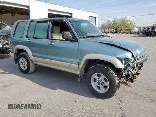 2002 Isuzu Trooper S z VIN JACDJ58X627J08662, wystawiony jako Copart lot #58969555 z przebiegiem 219 492 mil mil oraz Tytuł czysty. Historia ofert i sprzedaży dostępna na DreamBid. Obrazek 4.