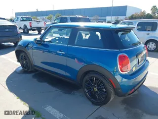 2024 MINI Hardtop 2 Door Cooper SE with VIN WMW13DJ01R2V90046, listed as a IAAI auction lot 41448064 with 3,963 mi miles. Bid and sale history available at carsss.com. Image 3.