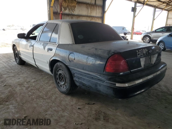 2005 Ford Police Interceptor with VIN 2FAFP71W85X121486, listed as a Copart auction lot 52652485 with 226,020 mi miles and Clean title. Bid and sale history available at DreamBid. Image 2.