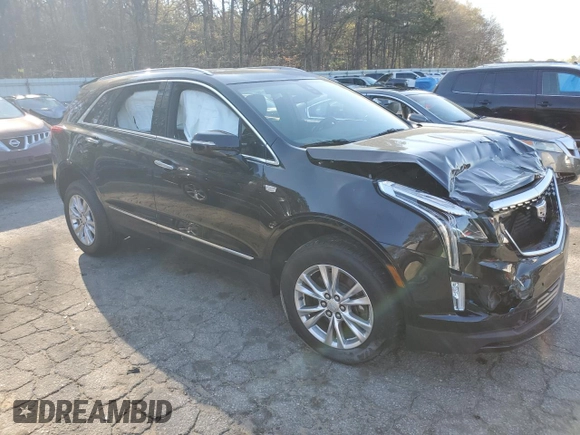 2020 Cadillac XT5 Luxury FWD with VIN 1GYKNAR43LZ167680, listed as a Copart auction lot 50603835 with 52,874 mi miles and Salvage title. Bid and sale history available at DreamBid. Image 4.