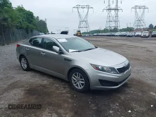 2011 Kia Optima LX z VIN KNAGM4A78B5059340, wystawiony jako IAAI lot #42508994 z przebiegiem 97 006 mil mil oraz . Historia ofert i sprzedaży dostępna na DreamBid. Obrazek 1.