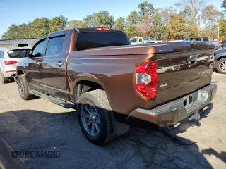 2015 Toyota Tundra 4WD Truck Platinum with VIN 5TFAW5F11FX423931, listed as a Copart auction lot 83350054 with 112,988 mi miles and Salvage Title. Bid and sale history available at carsss.com. Image 2.
