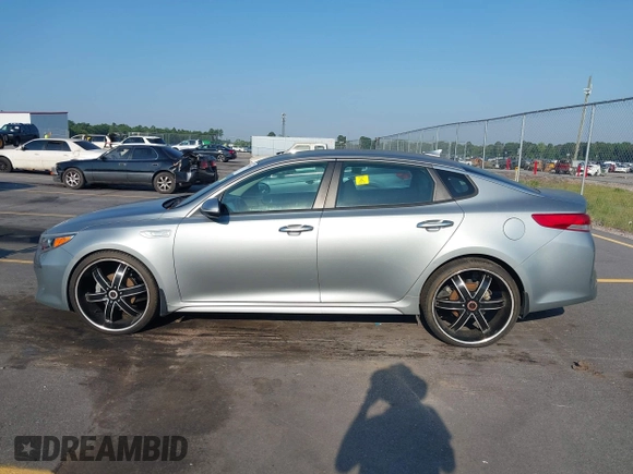 2017 Kia Optima z VIN KNAGT4LE2H5014899, wystawiony jako IAAI lot #42578989 z przebiegiem 110 363 mil mil oraz . Historia ofert i sprzedaży dostępna na DreamBid. Obrazek 14.