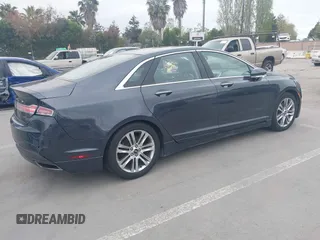 2013 Lincoln MKZ Hybrid with VIN 3LN6L2LU7DR820041, listed as a IAAI auction lot 42068963 with 265,256 mi miles. Bid and sale history available at carsss.com. Image 4.