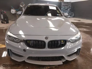 2018 BMW M3 with VIN WBS8M9C53J5J79991, listed as a IAAI auction lot 41881835 with 59,668 mi miles. Bid and sale history available at carsss.com. Image 12.
