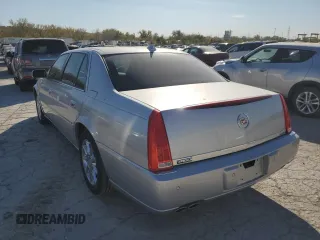 2010 Cadillac DTS w/1SC with VIN 1G6KD5EYXAU126775, listed as a Copart auction lot 77207094 with 100,288 mi miles and Salvage Title. Bid and sale history available at carsss.com. Image 2.