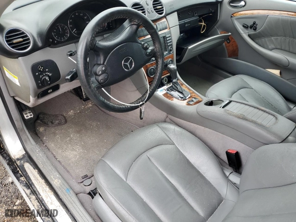 2007 Mercedes-Benz CLK-Class 3.5L with VIN WDBTK56G87F220761, listed as a Copart auction lot 74673524 with 145,402 mi miles and Salvage Title. Bid and sale history available at carsss.com. Image 7.