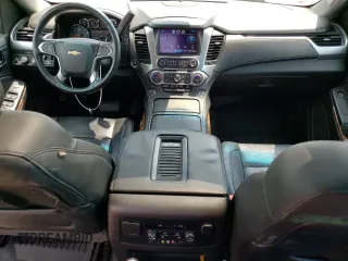 2015 Chevrolet Suburban LTZ with VIN 1GNSKKKC6FR556105, listed as a Copart auction lot 64034304 with 106,269 mi miles and Salvage Title. Bid and sale history available at DreamBid. Image 8.