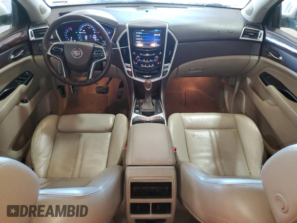 2015 Cadillac SRX Luxury Collection z VIN 3GYFNBE38FS618933, wystawiony jako Copart lot #45332835 z przebiegiem 64 819 mil mil oraz Szkody całkowita. Historia ofert i sprzedaży dostępna na DreamBid. Obrazek 8.