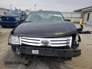 2009 Ford Taurus SE with VIN 1FAHP23W39G121125, listed as a Copart auction lot 80436544 with 122,908 mi miles and Clean Title. Bid and sale history available at carsss.com. Image 5.