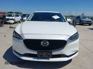 2021 Mazda 6 Touring with VIN JM1GL1VM4M1618686, listed as a IAAI auction lot 42079730 with 55,539 mi miles and . Bid and sale history available at DreamBid. Image 12.