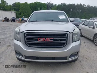 2015 GMC Yukon XL SLT with VIN 1GKS1HKC2FR251672, listed as a IAAI auction lot 42152312 with 232,736 mi miles and . Bid and sale history available at carsss.com. Image 12.