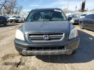 2004 Honda Pilot EX with VIN 2HKYF18534H587990, listed as a Copart auction lot 43003585 with 283,562 mi miles and Salvage Title. Bid and sale history available at DreamBid. Image 5.