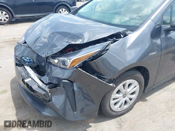 2021 Toyota Prius L Eco z VIN JTDKAMFU3M3152785, wystawiony jako IAAI lot #42501351 z przebiegiem 60 489 mil mil oraz . Historia ofert i sprzedaży dostępna na DreamBid. Obrazek 17.