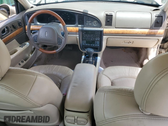 2001 Lincoln Continental z VIN 1LNHM97V91Y622267, wystawiony jako Copart lot #59915445 z przebiegiem 77 070 mil mil oraz Szkoda całkowita • Salvage title. Historia ofert i sprzedaży dostępna na DreamBid. Obrazek 8.