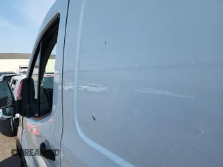 2015 Ford Transit Cargo with VIN 1FTNR1ZM9FKA60864, listed as a IAAI auction lot 42685568 with 154,262 mi miles and . Bid and sale history available at DreamBid. Image 26.
