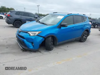 2016 Toyota RAV4 SE with VIN JTMJFREV3GJ076876, listed as a IAAI auction lot 41566899 with 133,216 mi miles and . Bid and sale history available at DreamBid. Image 2.