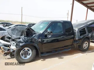 1999 Ford F-150 XL with VIN 1FTRX08L3XKB12260, listed as a IAAI auction lot 42244781 with Not provided miles and . Bid and sale history available at DreamBid. Image 13.