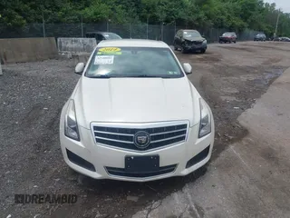 2014 Cadillac ATS Standard RWD with VIN 1G6AA5RA5E0173517, listed as a IAAI auction lot 42540181 with 73,732 mi miles and . Bid and sale history available at DreamBid. Image 12.