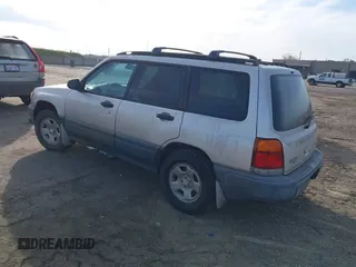 2000 Subaru Forester L with VIN JF1SF6355YH721788, listed as a IAAI auction lot 41736026 with 305,157 mi miles. Bid and sale history available at carsss.com. Image 3.