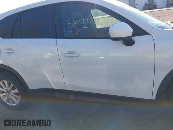 2014 Mazda CX-5 Sport with VIN JM3KE2BE8E0301175, listed as a IAAI auction lot 42051972 with 121,821 mi miles and . Bid and sale history available at carsss.com. Image 13.