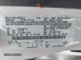 2014 Ford Focus Titanium with VIN 1FADP3N27EL330366, listed as a IAAI auction lot 42719377 with 97,009 mi miles and . Bid and sale history available at DreamBid. Image 9.