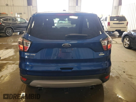2017 Ford Escape SE z VIN 1FMCU0GD5HUB42421, wystawiony jako Copart lot #56952185 z przebiegiem 106 146 mil mil oraz Nie do naprawy • Non repairable. Historia ofert i sprzedaży dostępna na DreamBid. Obrazek 6.