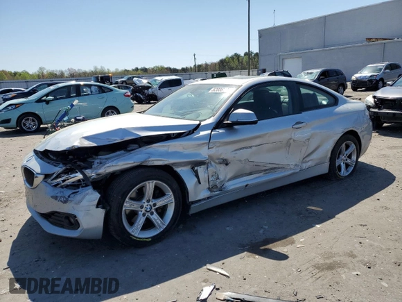 2014 BMW 4 Series 428i xDrive with VIN WBA3N5C51EF716572, listed as a Copart auction lot 52086365 with 209,742 mi miles and Salvage Title. Bid and sale history available at DreamBid. Image 1.