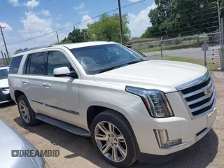2015 Cadillac Escalade Luxury z VIN 1GYS4BKJ1FR215223, wystawiony jako IAAI lot #42548931 z przebiegiem 145 947 mil mil oraz . Historia ofert i sprzedaży dostępna na DreamBid. Obrazek 13.