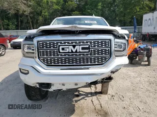 2017 GMC Sierra 1500 Denali z VIN 3GTU2PEJ2HG433669, wystawiony jako Copart lot #57460285 z przebiegiem 131 113 mil mil oraz Szkoda całkowita • Salvage title. Historia ofert i sprzedaży dostępna na DreamBid. Obrazek 5.