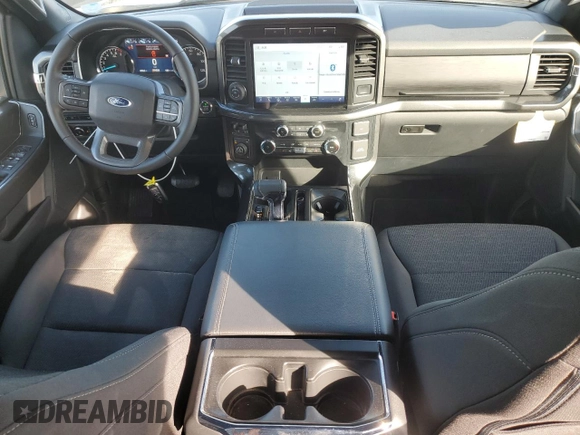 2023 Ford F-150 XL with VIN 1FTEW1EP4PFB38678, listed as a Copart auction lot 43024045 with 8,718 mi miles and Salvage title. Bid and sale history available at DreamBid. Image 8.
