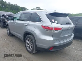 2014 Toyota Highlander XLE z VIN 5TDKKRFH1ES024090, wystawiony jako IAAI lot #42123199 z przebiegiem 58 751 mil mil oraz . Historia ofert i sprzedaży dostępna na DreamBid. Obrazek 3.