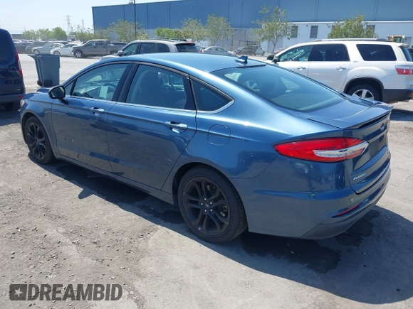 2019 Ford Fusion SE with VIN 3FA6P0HD6KR177660, listed as a IAAI auction lot 42164831 with 66,585 mi miles and . Bid and sale history available at DreamBid. Image 3.