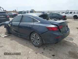 2020 Honda Insight Touring with VIN 19XZE4F94LE006918, listed as a IAAI auction lot 41777662 with Not Provided miles and . Bid and sale history available at carsss.com. Image 3.