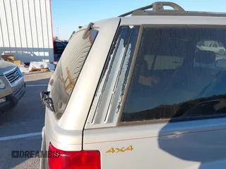 1997 Jeep Grand Cherokee Limited with VIN 1J4GZ78Y8VC718435, listed as a IAAI auction lot 41405361 with 210,599 mi miles. Bid and sale history available at carsss.com. Image 13.