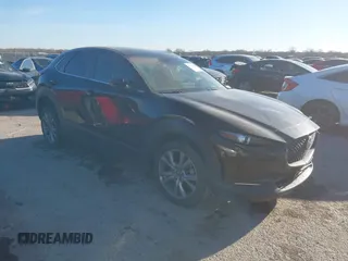 2021 Mazda CX-30 Select z VIN 3MVDMABL2MM239067, wystawiony jako IAAI lot #41799222 z przebiegiem 53 870 mil mil oraz . Historia ofert i sprzedaży dostępna na DreamBid. Obrazek 1.