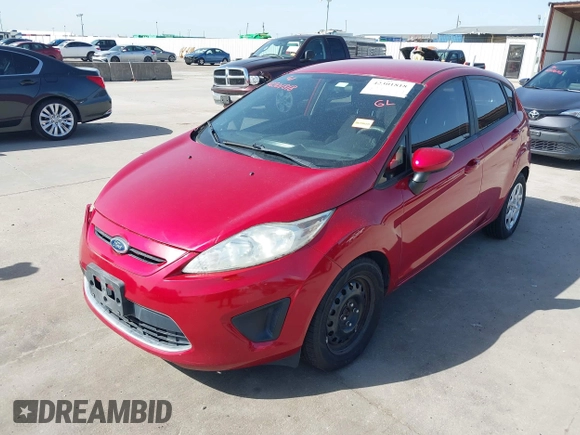 2012 Ford Fiesta SE z VIN 3FADP4EJ9CM140948, wystawiony jako IAAI lot #42301818 z przebiegiem 109 276 mil mil oraz . Historia ofert i sprzedaży dostępna na DreamBid. Obrazek 19.