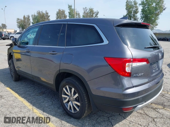 2020 Honda Pilot EX-L z VIN 5FNYF6H50LB047202, wystawiony jako IAAI lot #42117776 z przebiegiem 119 726 mil mil oraz . Historia ofert i sprzedaży dostępna na DreamBid. Obrazek 3.