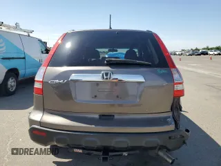 2009 Honda CR-V EX z VIN 5J6RE38539L024809, wystawiony jako Copart lot #57334415 z przebiegiem 172 763 mil mil oraz Szkoda całkowita • Salvage title. Historia ofert i sprzedaży dostępna na DreamBid. Obrazek 6.