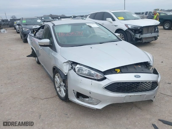 2016 Ford Focus SE with VIN 1FADP3F23GL316269, listed as a IAAI auction lot 41634634 with 71,617 mi miles. Bid and sale history available at carsss.com. Image 1.