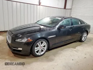 2016 Jaguar XJ Portfolio z VIN SAJWJ2GD0G8V92699, wystawiony jako Copart lot #59138065 z przebiegiem 123 065 mil mil oraz Czysty tytuł • Clean title. Historia ofert i sprzedaży dostępna na DreamBid. Obrazek 1.