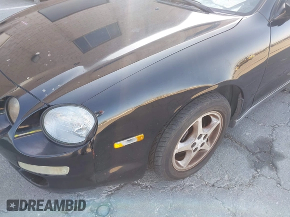 1998 Toyota Celica GT z VIN JT5FG02T6W0047793, wystawiony jako IAAI lot #42312714 z przebiegiem 146 201 mil mil oraz . Historia ofert i sprzedaży dostępna na DreamBid. Obrazek 17.