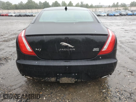 2016 Jaguar XJ R-Sport with VIN SAJWJ1CD7G8V95129, listed as a Copart auction lot 73569464 with 143,740 mi miles and Clean title. Bid and sale history available at DreamBid. Image 6.