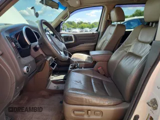 2008 Honda Ridgeline RTL with VIN 2HJYK16508H540795, listed as a Copart auction lot 65243545 with 168,807 mi miles and Salvage title. Bid and sale history available at DreamBid. Image 7.