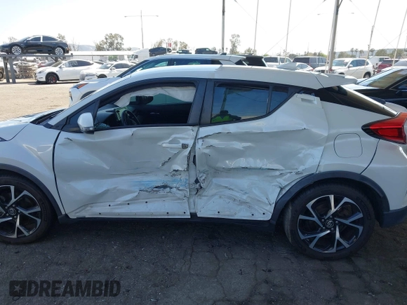 2018 Toyota C-HR XLE with VIN NMTKHMBX9JR022921, listed as a IAAI auction lot 41858651 with 50,448 mi miles. Bid and sale history available at carsss.com. Image 6.