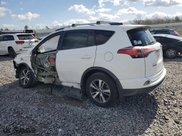 2016 Toyota RAV4 XLE with VIN 2T3WFREV3GW263574, listed as a Copart auction lot 48700335 with 61,103 mi miles and Salvage Title. Bid and sale history available at carsss.com. Image 2.