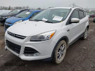 2016 Ford Escape Titanium with VIN 1FMCU9J94GUC22994, listed as a IAAI auction lot 42010816 with 80,293 mi miles. Bid and sale history available at carsss.com. Image 17.